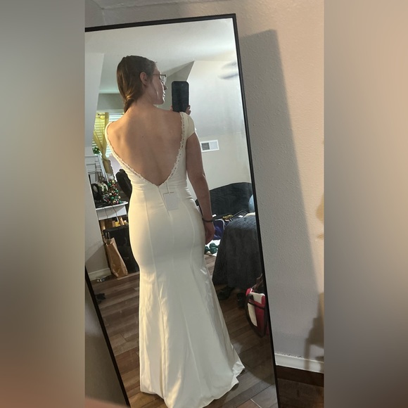 Lulu’s Love Will Follow White Cap Sleeve Mermaid
Maxi Dress - Picture 3 of 6